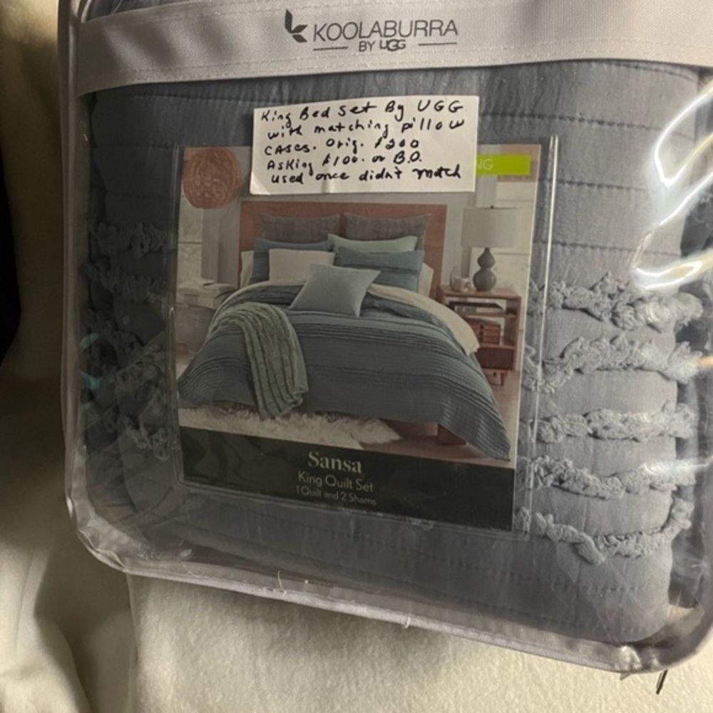 Loola quilt spread by UGG with shams. 20 by 30 king size